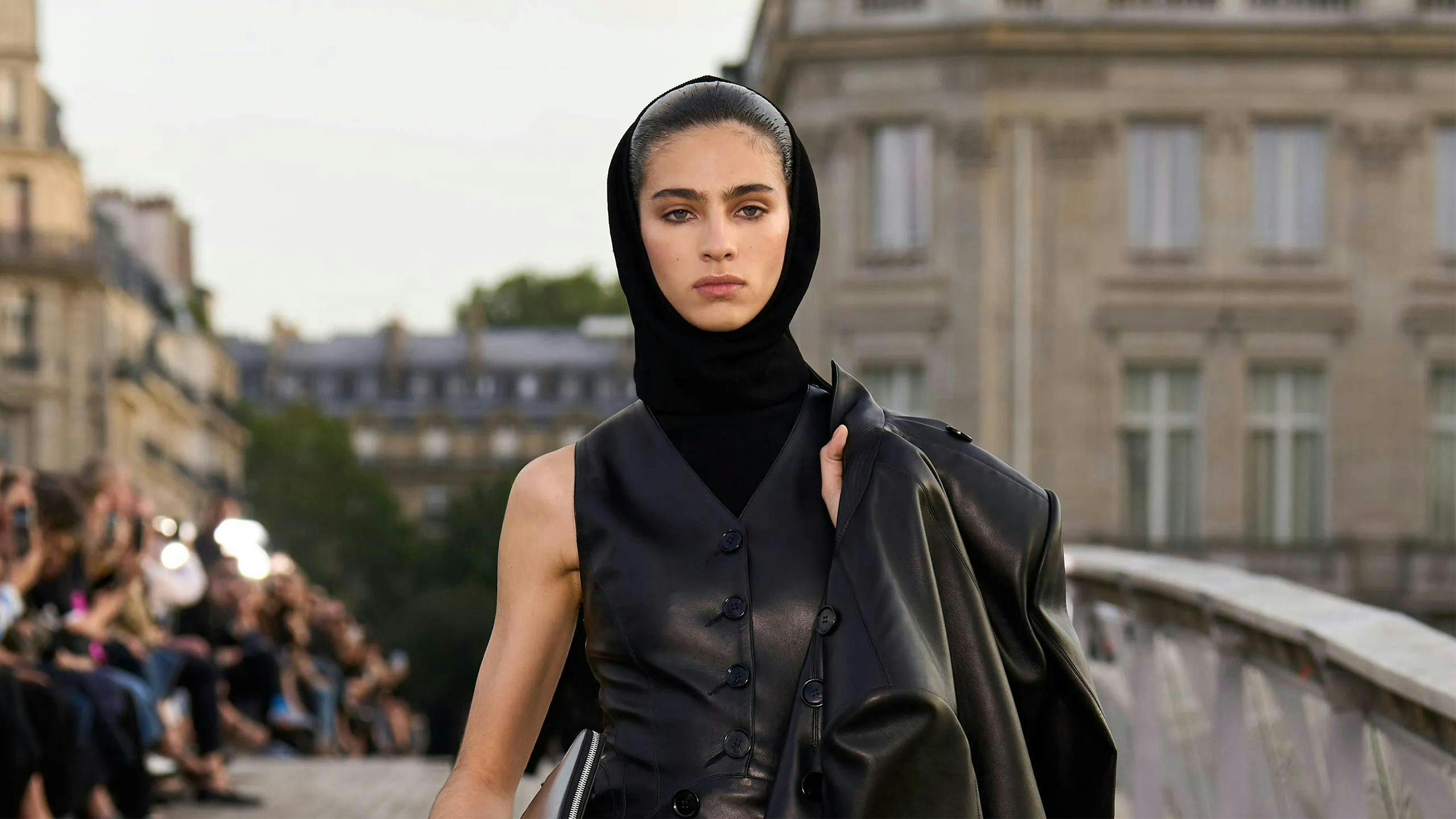 adult female person woman clothing coat black hair people fashion handbag