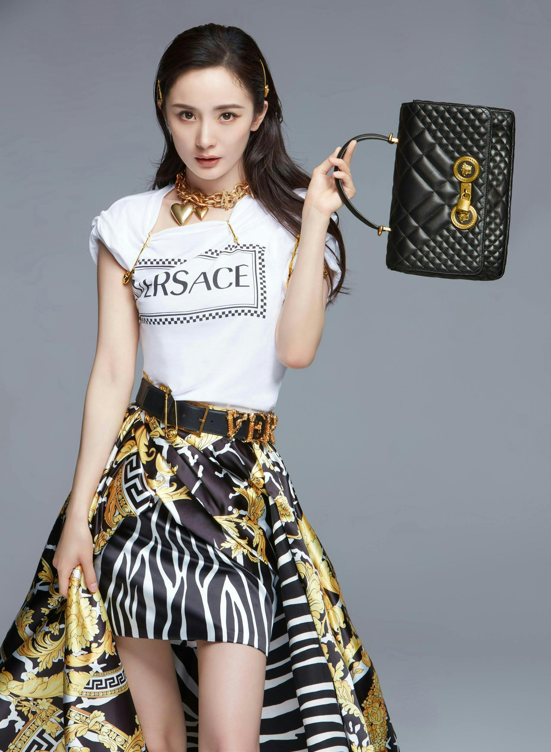 handbag accessories bag accessory skirt clothing apparel person purse female