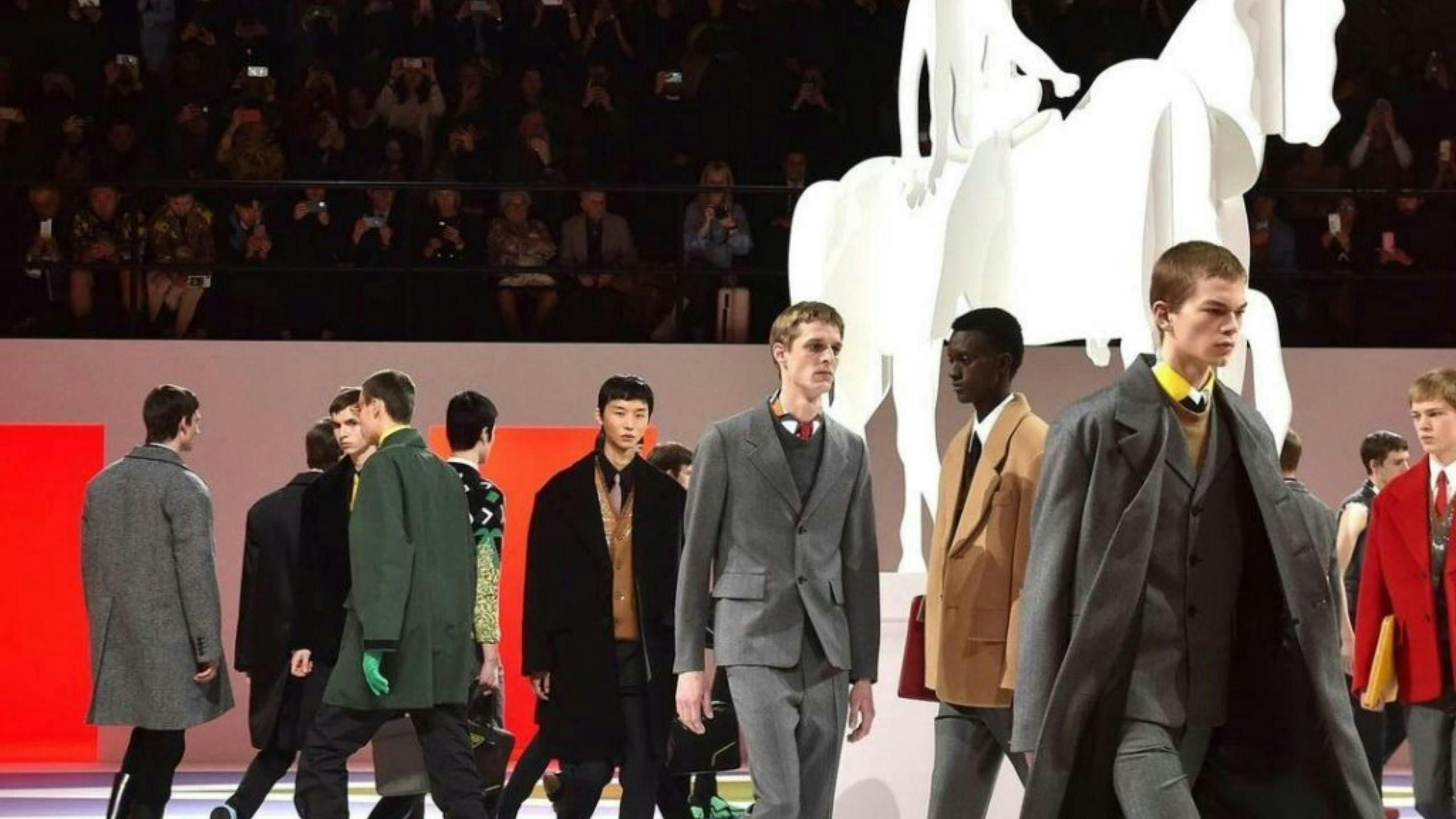 person human suit coat overcoat clothing apparel fashion premiere