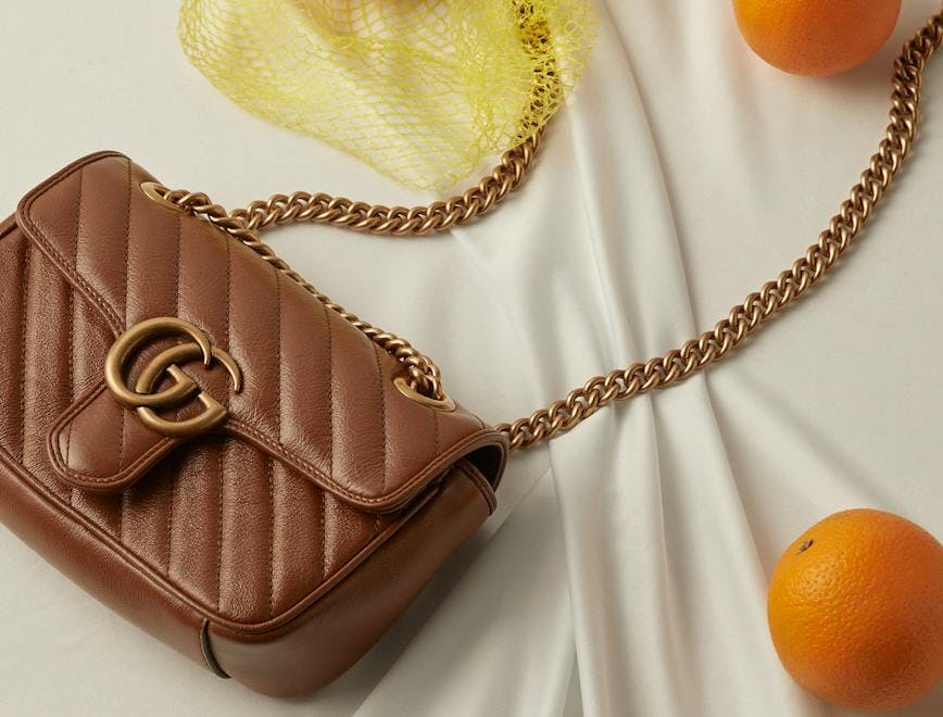 orange food fruit citrus fruit plant accessories handbag bag necklace jewelry
