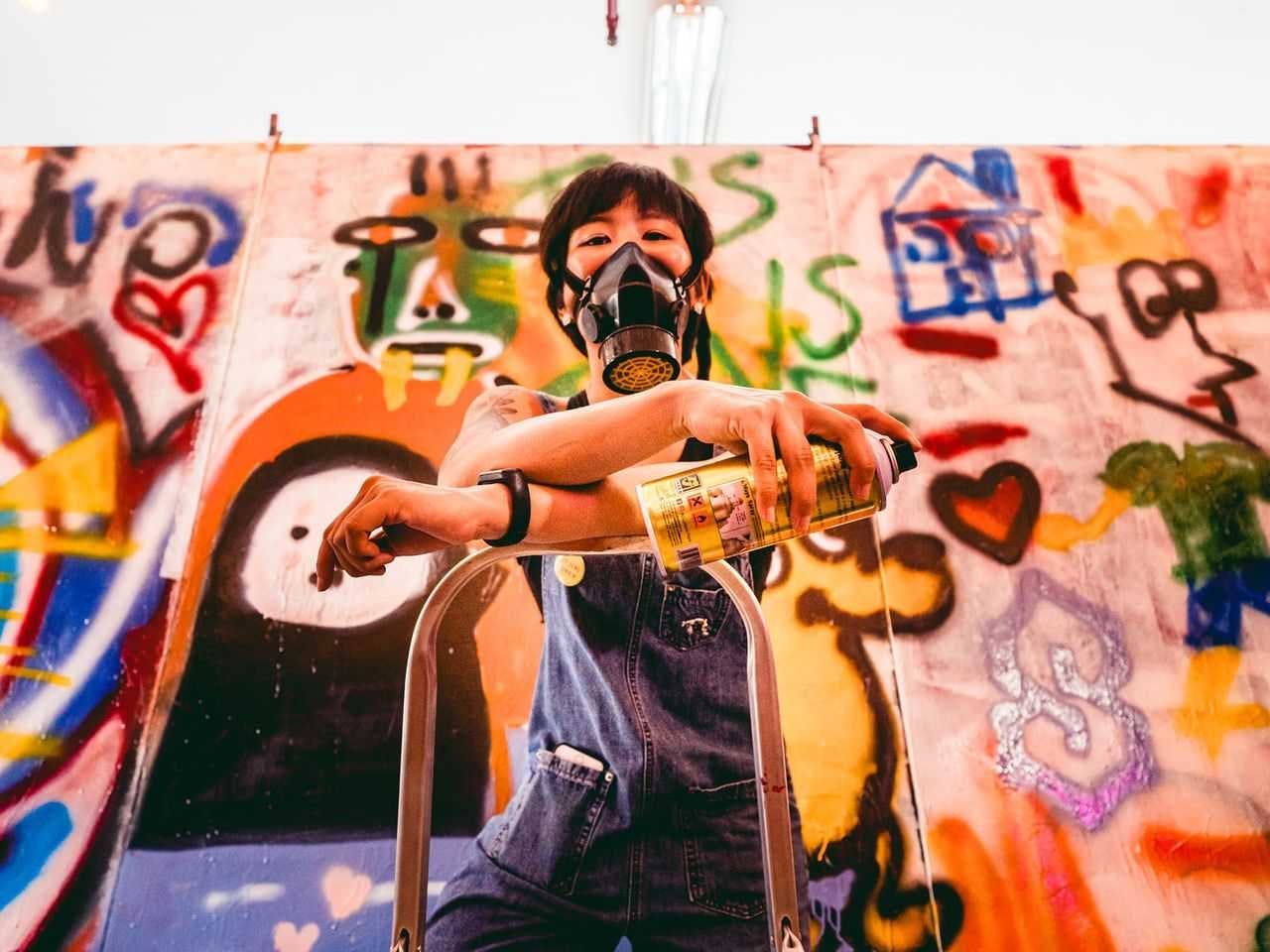 person human art mural painting graffiti